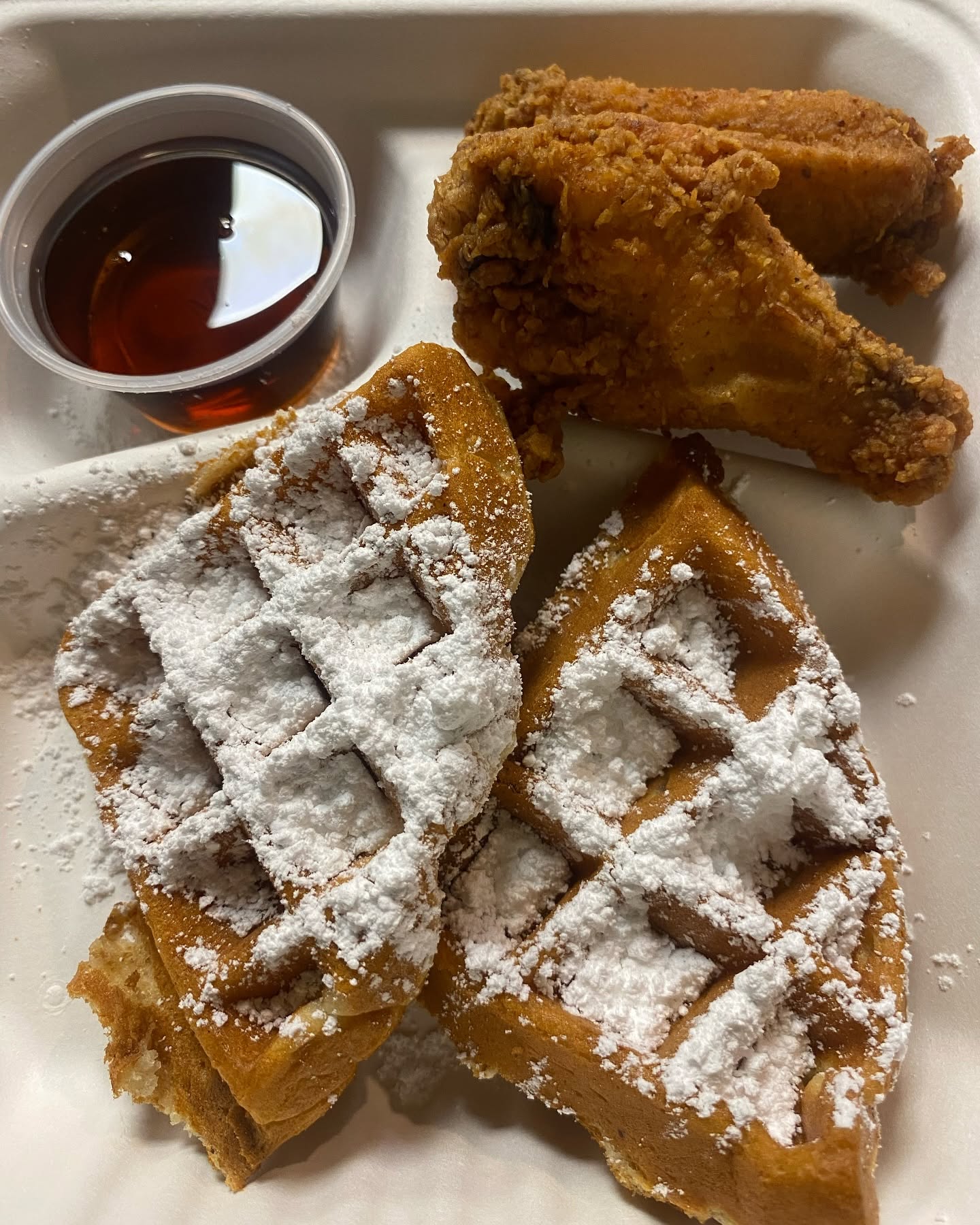 Fried chicken wingz with powdered sugar waffles and syrup