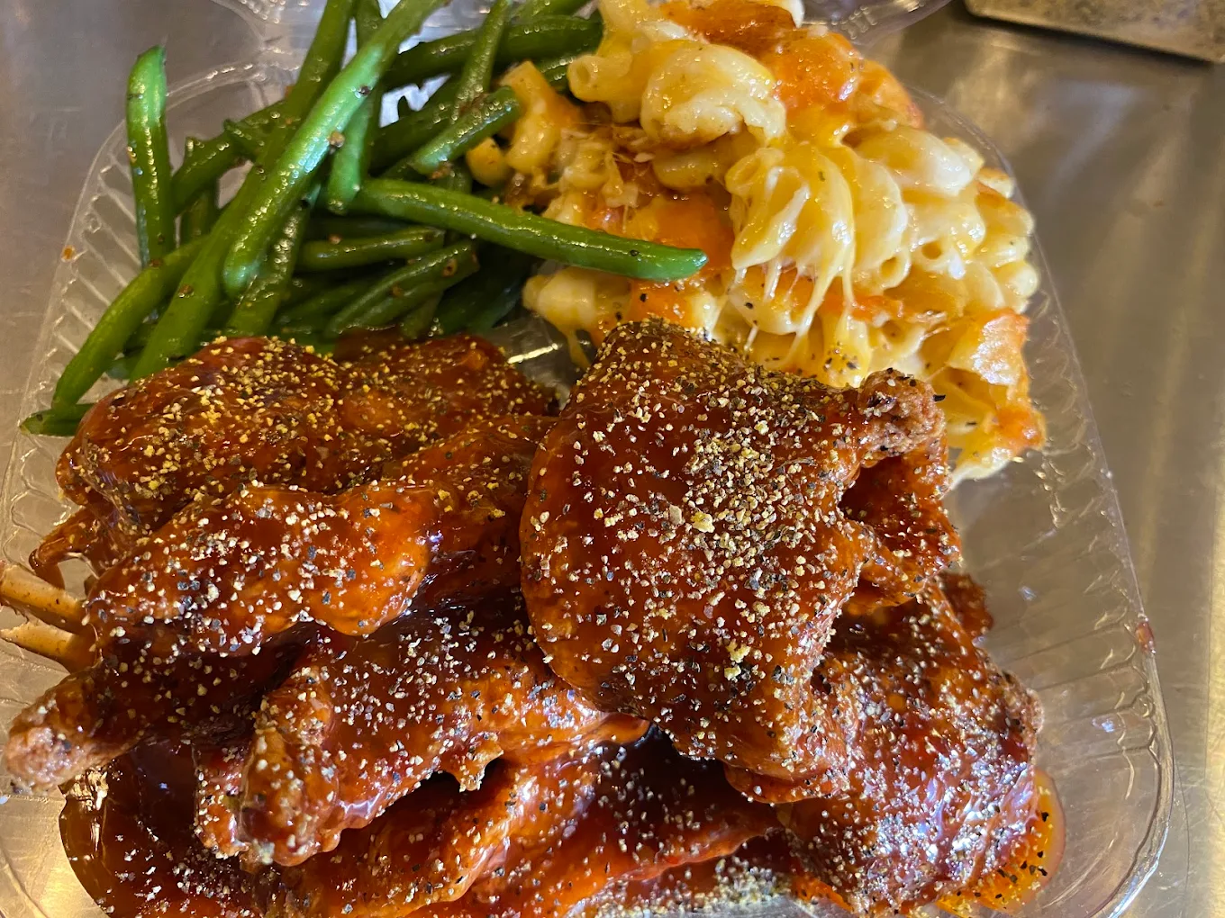 Saucy wingz with green beans and mac n cheese